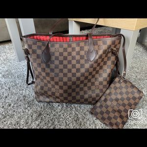 Checkered bag with clutch.